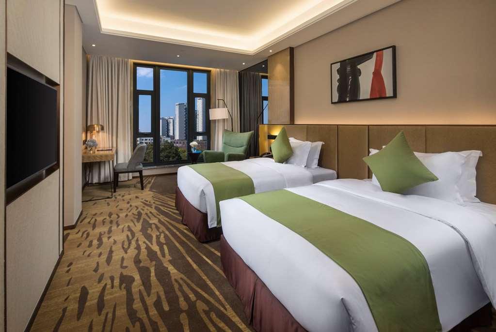 Leshan Ramada Hotel Quarto foto