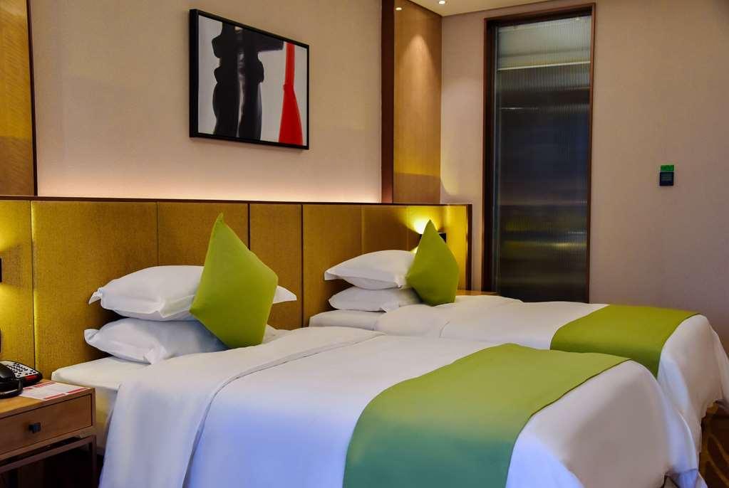 Leshan Ramada Hotel Quarto foto