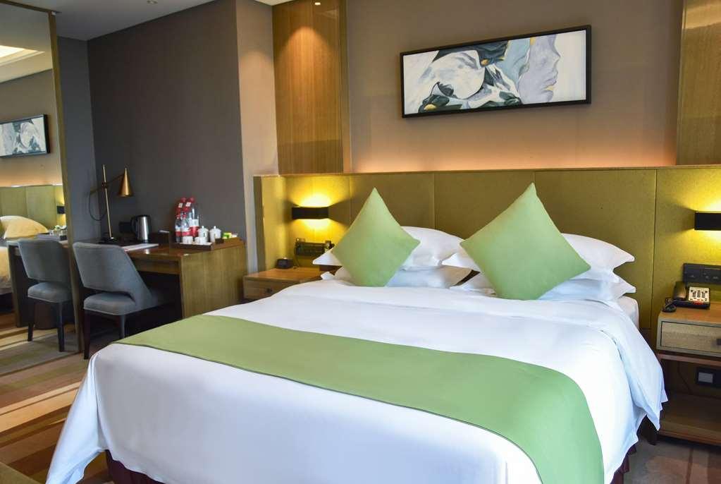 Leshan Ramada Hotel Quarto foto