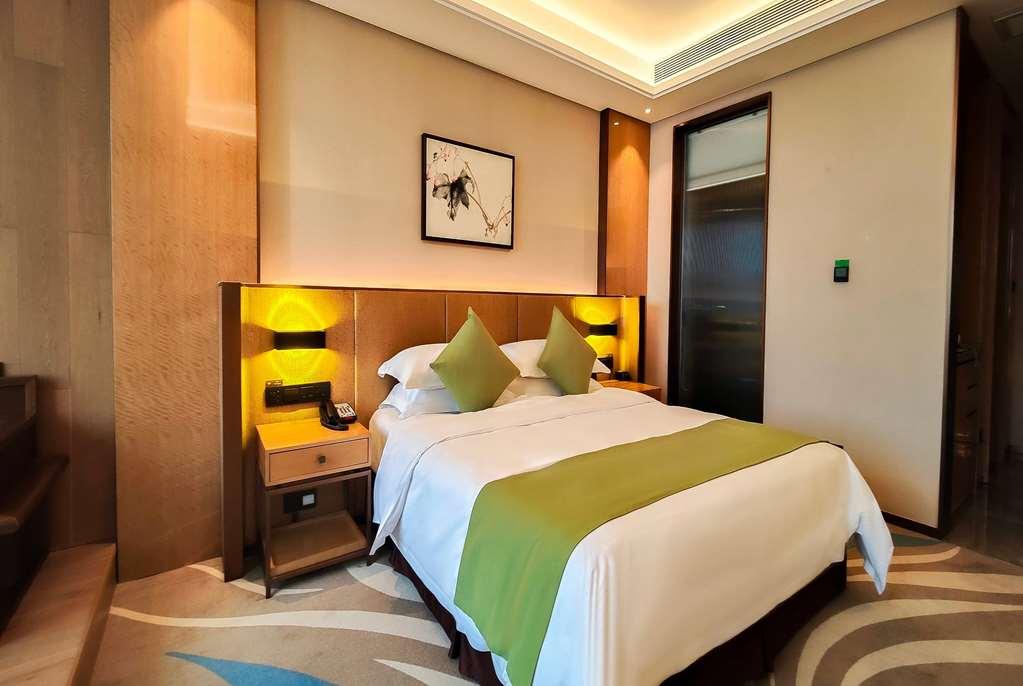 Leshan Ramada Hotel Quarto foto