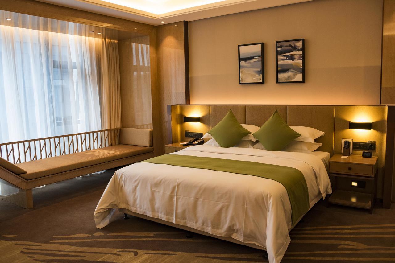 Leshan Ramada Hotel Exterior foto